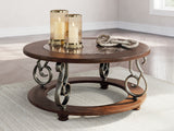Frallyn - Round Cocktail Table - Dark Brown