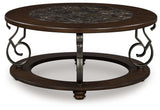 Frallyn - Round Cocktail Table - Dark Brown